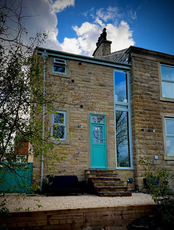 Front view of the finished two-storey extension