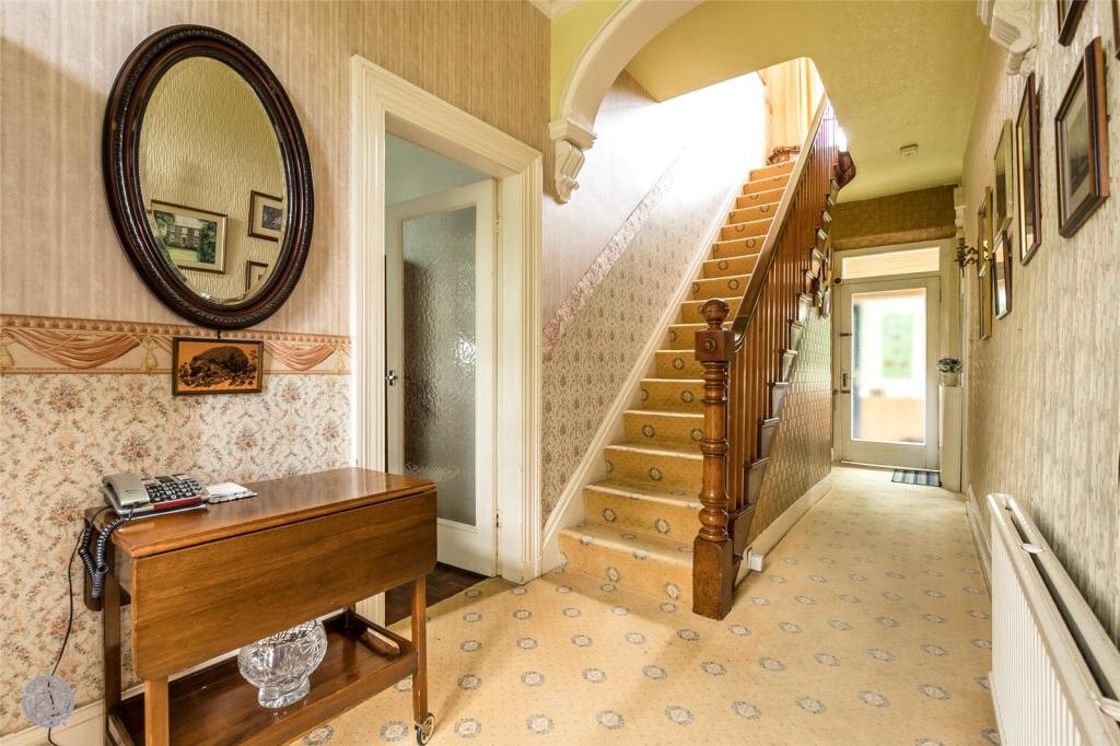 The hallway from the kitchen door, before