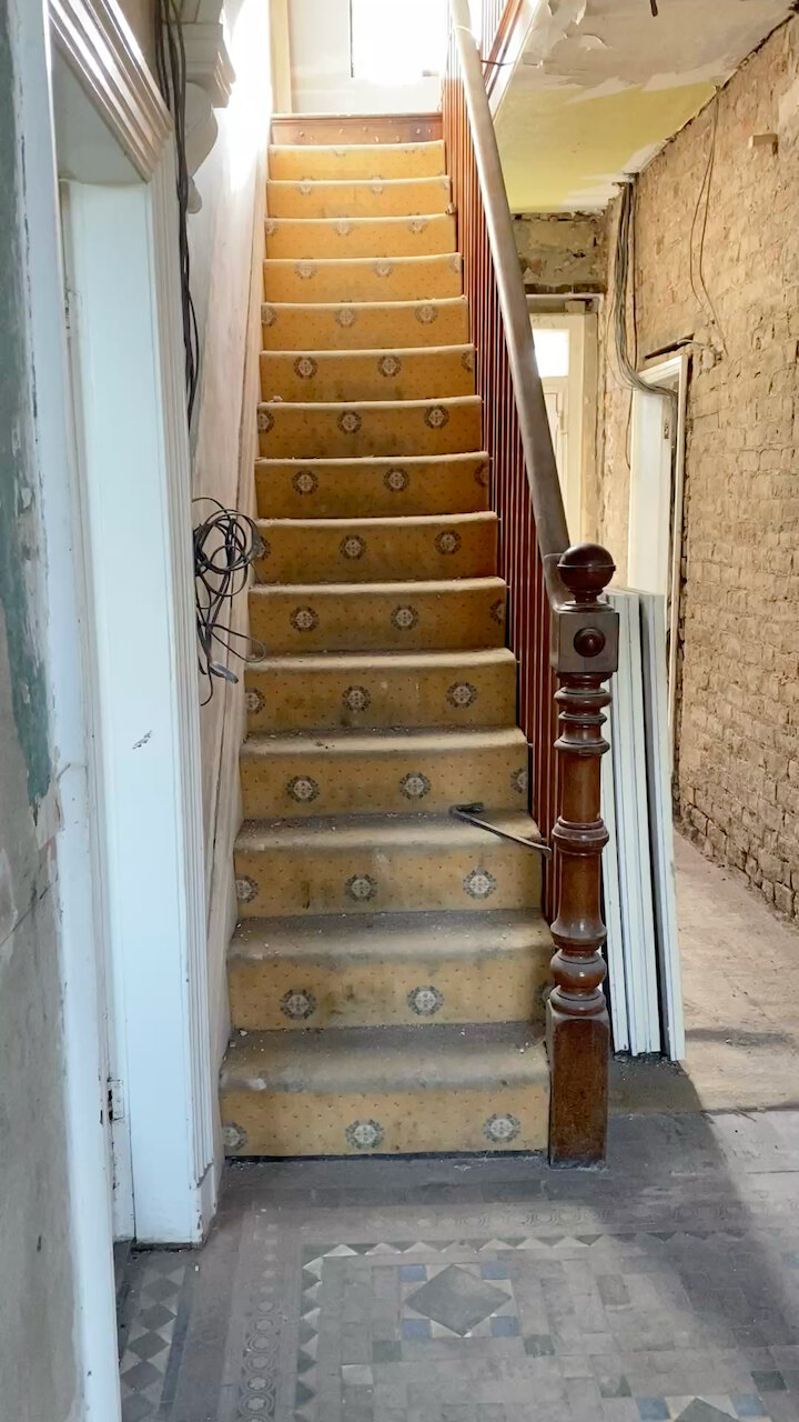 The hallway from the kitchen door, during