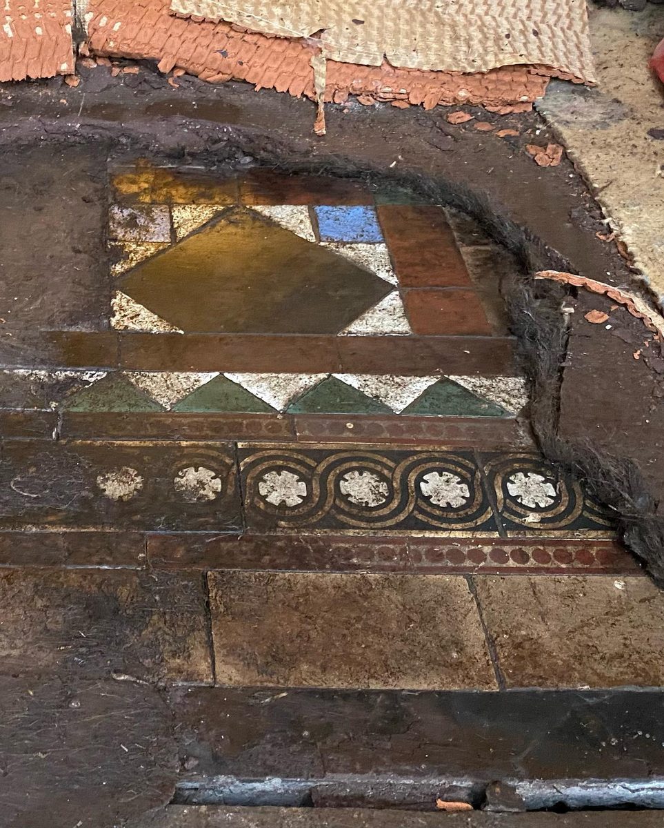 Original encaustic tiles found at the back door (3/3)