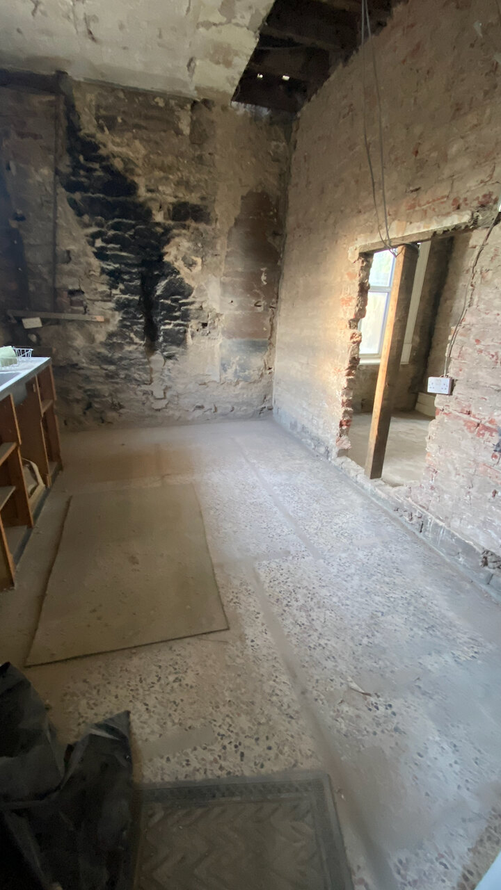 The kitchen during restoration